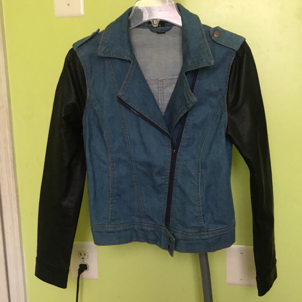 Denim jacket with leather sleeves